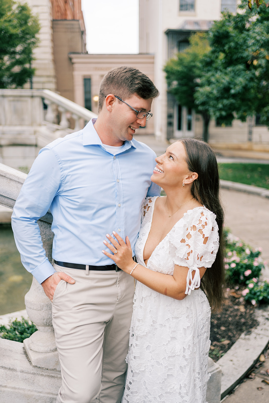 Couple smiles at their Baltimore engagement photo location