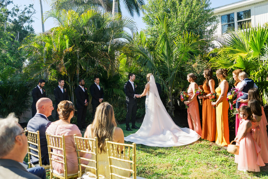 True to color wedding photography of bride and groom saying vows