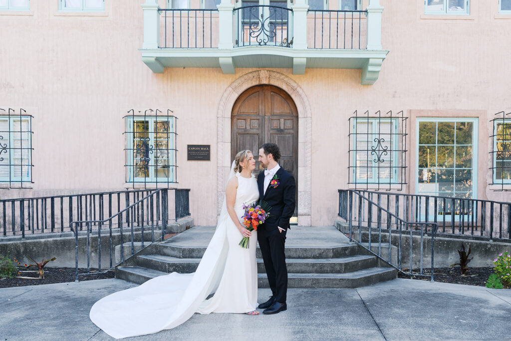 Bride and groom pose for true to color wedding photos