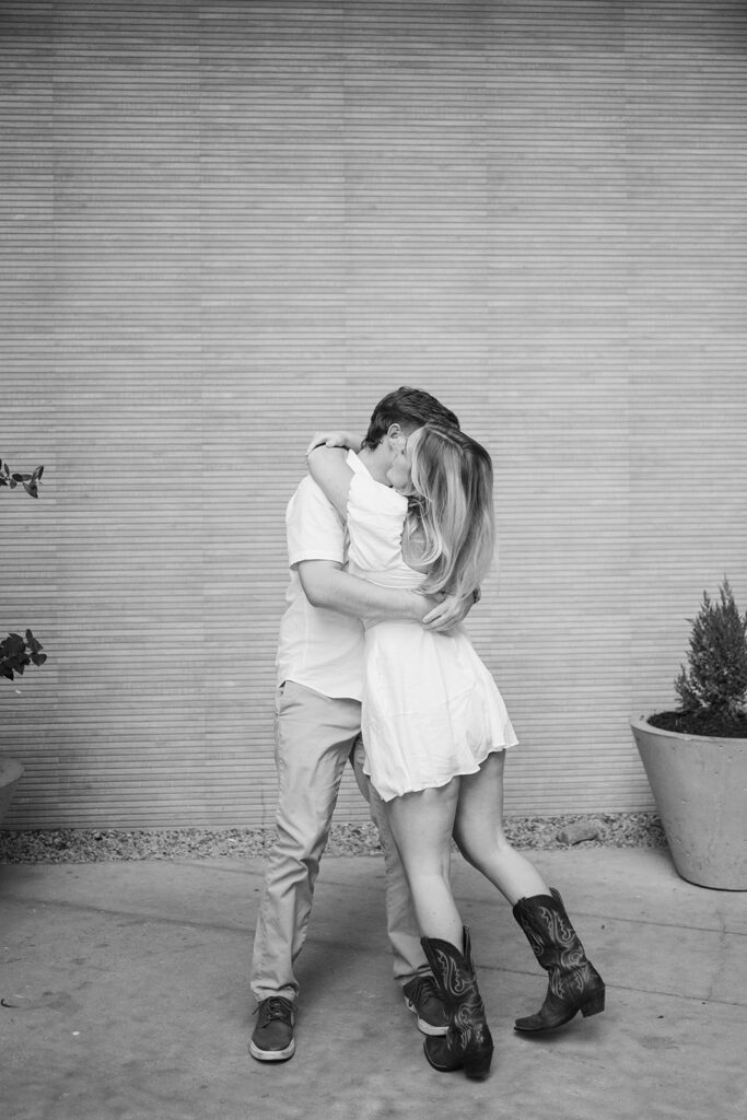 Couple kisses during their engagement session