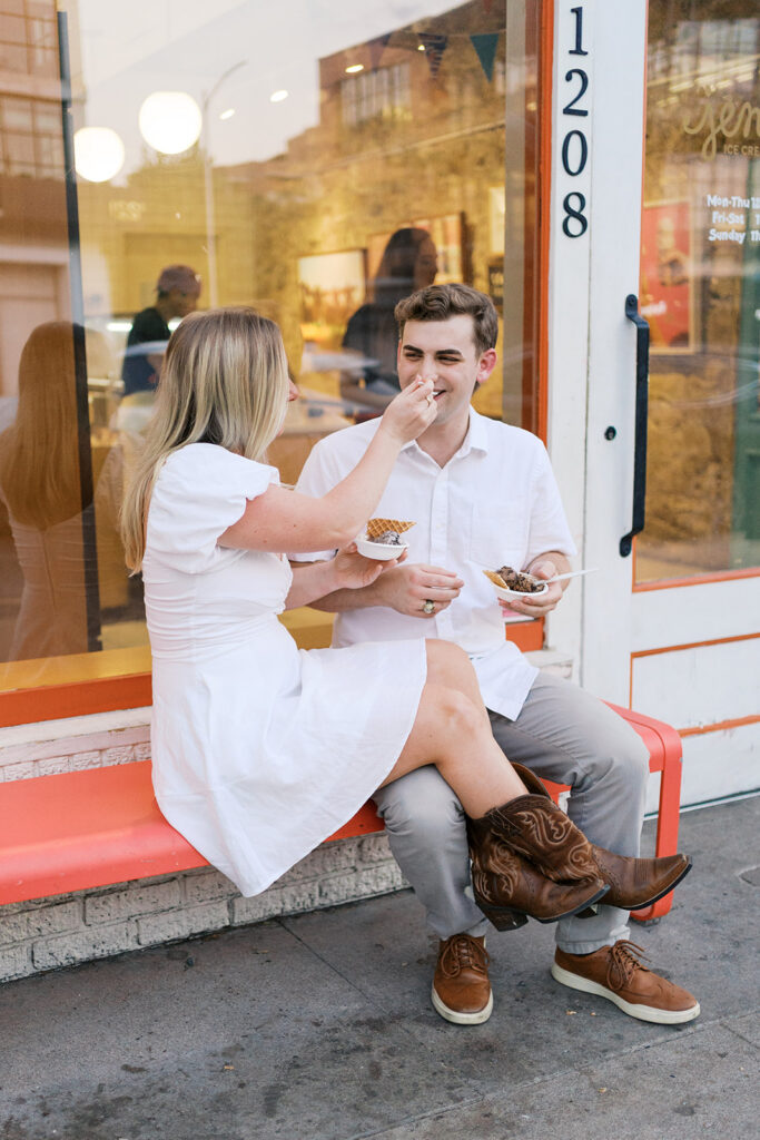 Couple eats ice cream during engagement session