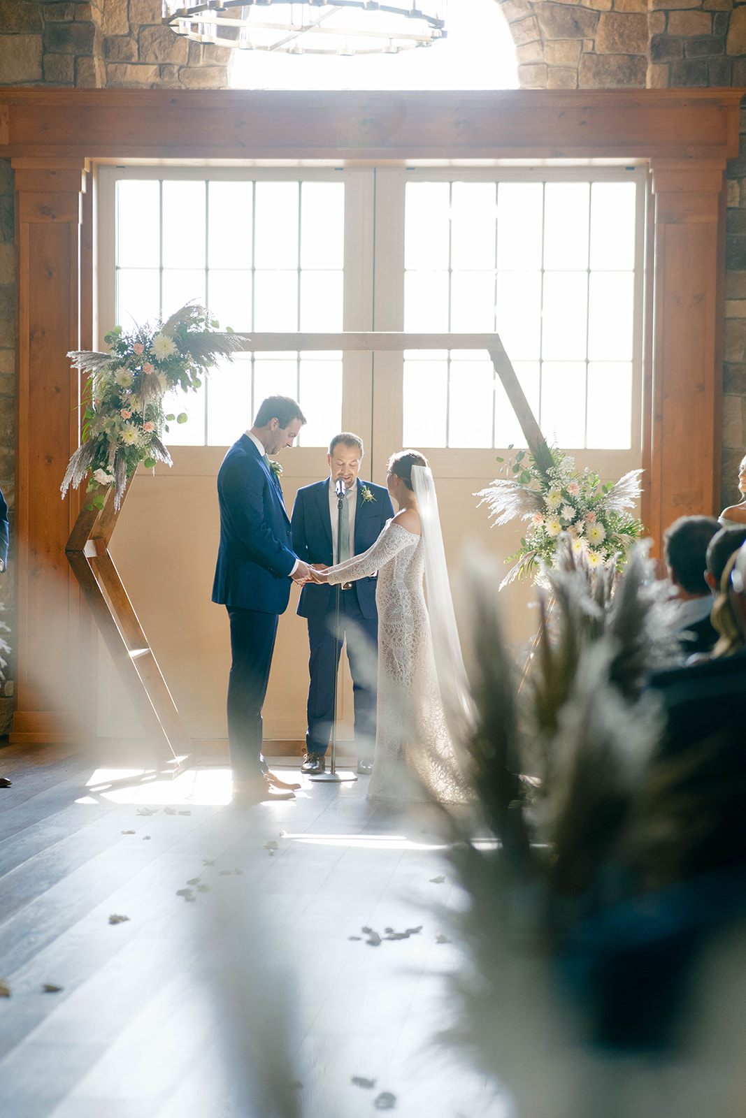 Couple says their vows at their Vignon Manor Farm wedding