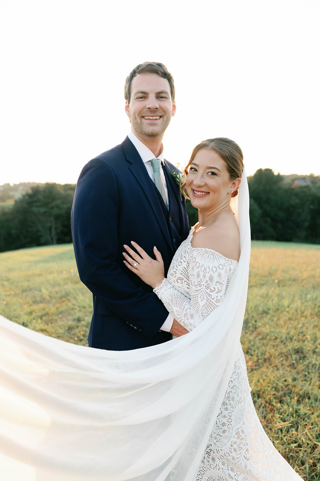 Bride and groom smile at their Vignon Manor Farm wedding