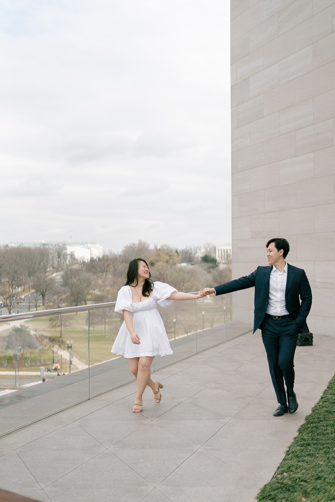 Couple holding hands at the National Gallery of Art