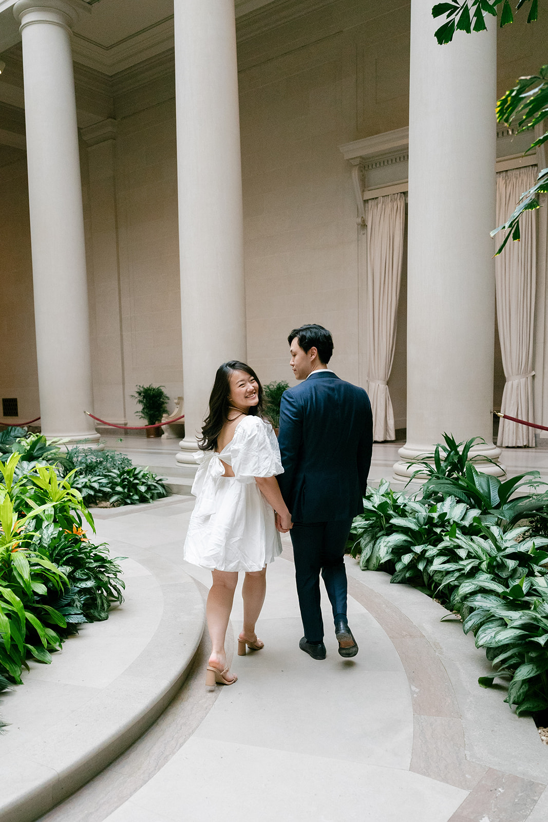 couple at their national gallery of art engagement photoshoot