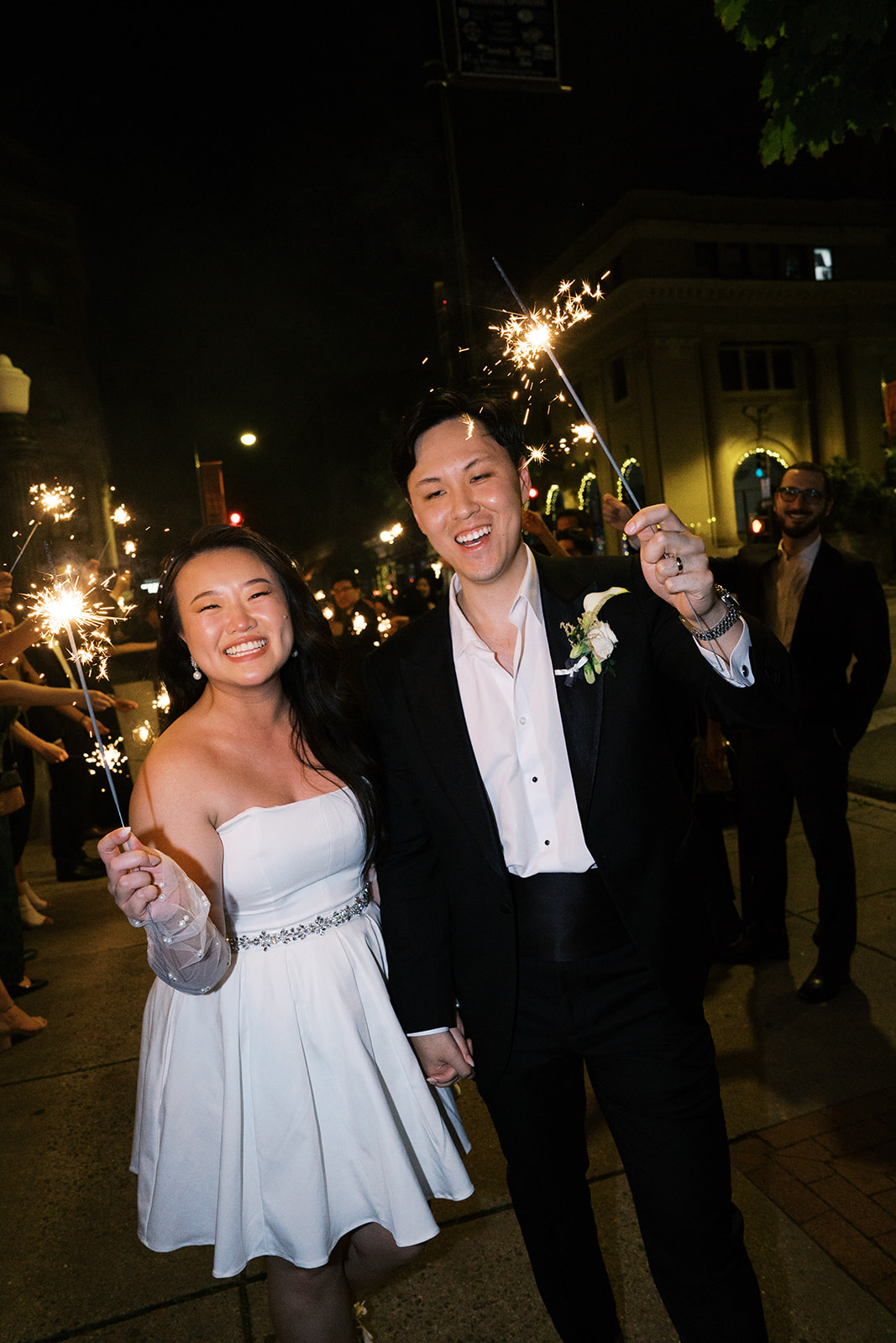 Bride and groom exiting the Citizens Ballroom wedding